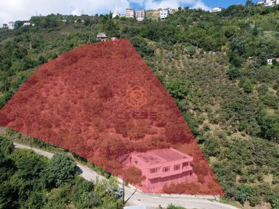 AKÇAABAT AKÇAKALE’DE DENİZ MANZARALI 7.192 M² SATILIK EV VE ARSA
